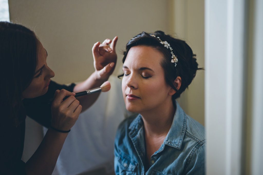 Bride getting her makeup done for her Chicago wedding