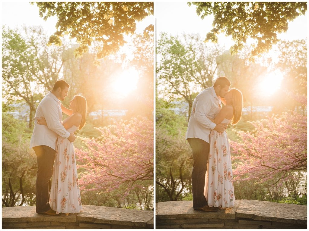 A couple kisses in front of the setting sun at a popular Chicago photo spot, Alfred Caldwell Lily Pool.